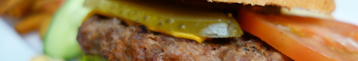 Eating American (Traditional) Burger at The Butterfly Grille restaurant in Nipomo, CA.
